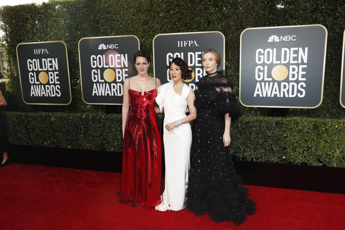 "Killing Eve" writer-producer Phoebe Waller-Bridge, from left, and stars Sandra Oh, and Jodie Comer.