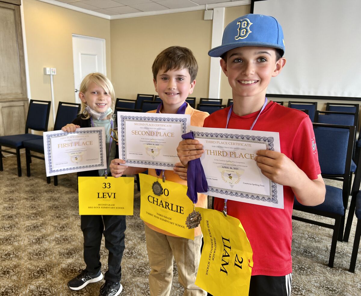 From left, the top three finishers in the second- and third-grade division: Levi Pancer, Charlie Fiorentino and Liam Burke