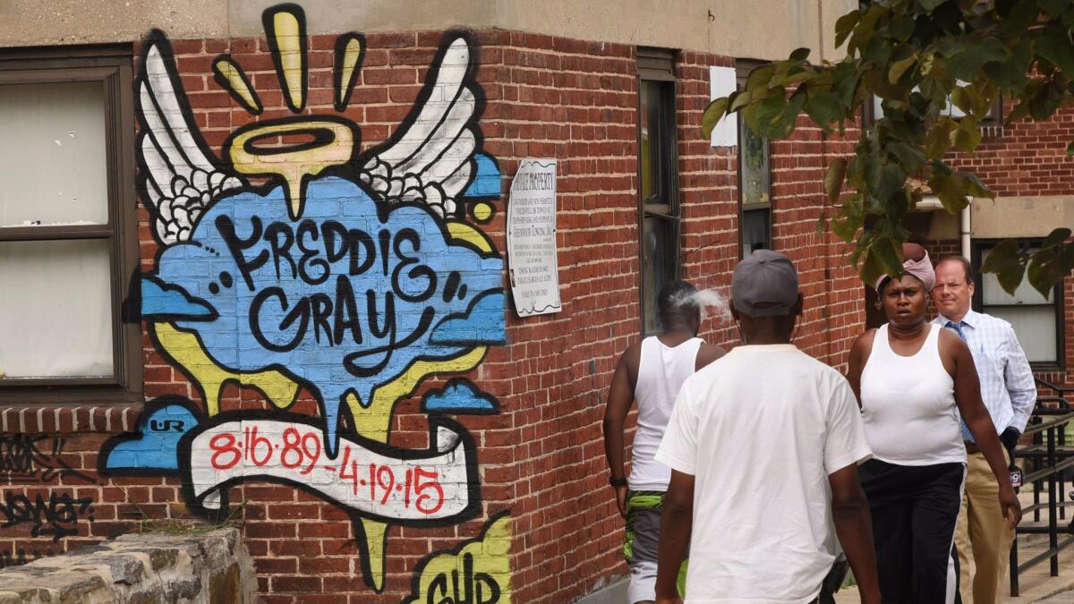 A mural in Baltimore commemorates Freddie Gray, whose death while in police custody led to reforms of the Baltimore Police Department.