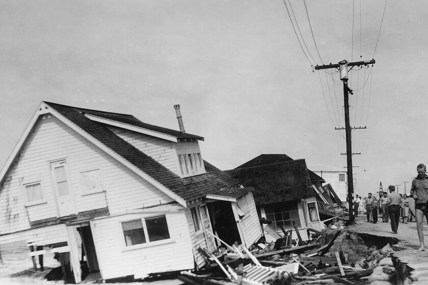 Damage from the September 1939 Cordonazo tropical storm in Orange County’s Sunset Beach.(Orange County Archives)