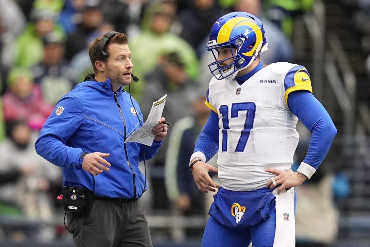 Rams head coach Sean McVay talks to quarterback Baker Mayfield during their game at Seattle.
