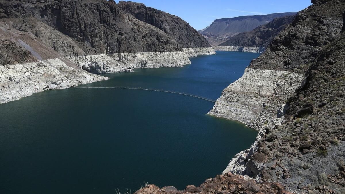 The "bathtub ring" around Lake Mead tells the story of its longtime decline in water level.
