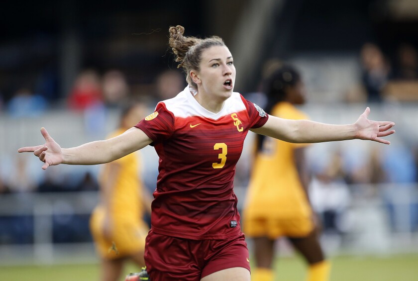 USC midfielder Morgan Andrews celebrates after scoring a goal against West Virginia in the second minute of the College Cup Final on Sunday.