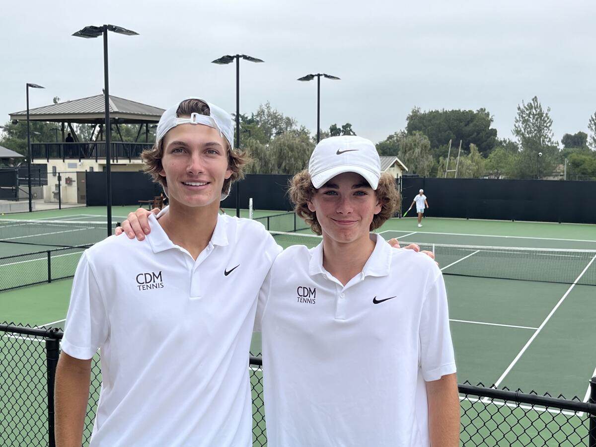 Corona del Mar High junior Jonathan Hinkel, left, and sophomore Roger Genc advanced to the doubles round of 16 on Tuesday.
