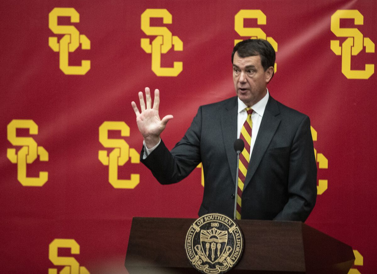 USC athletic director Mike Bohn speaks during a news conference.