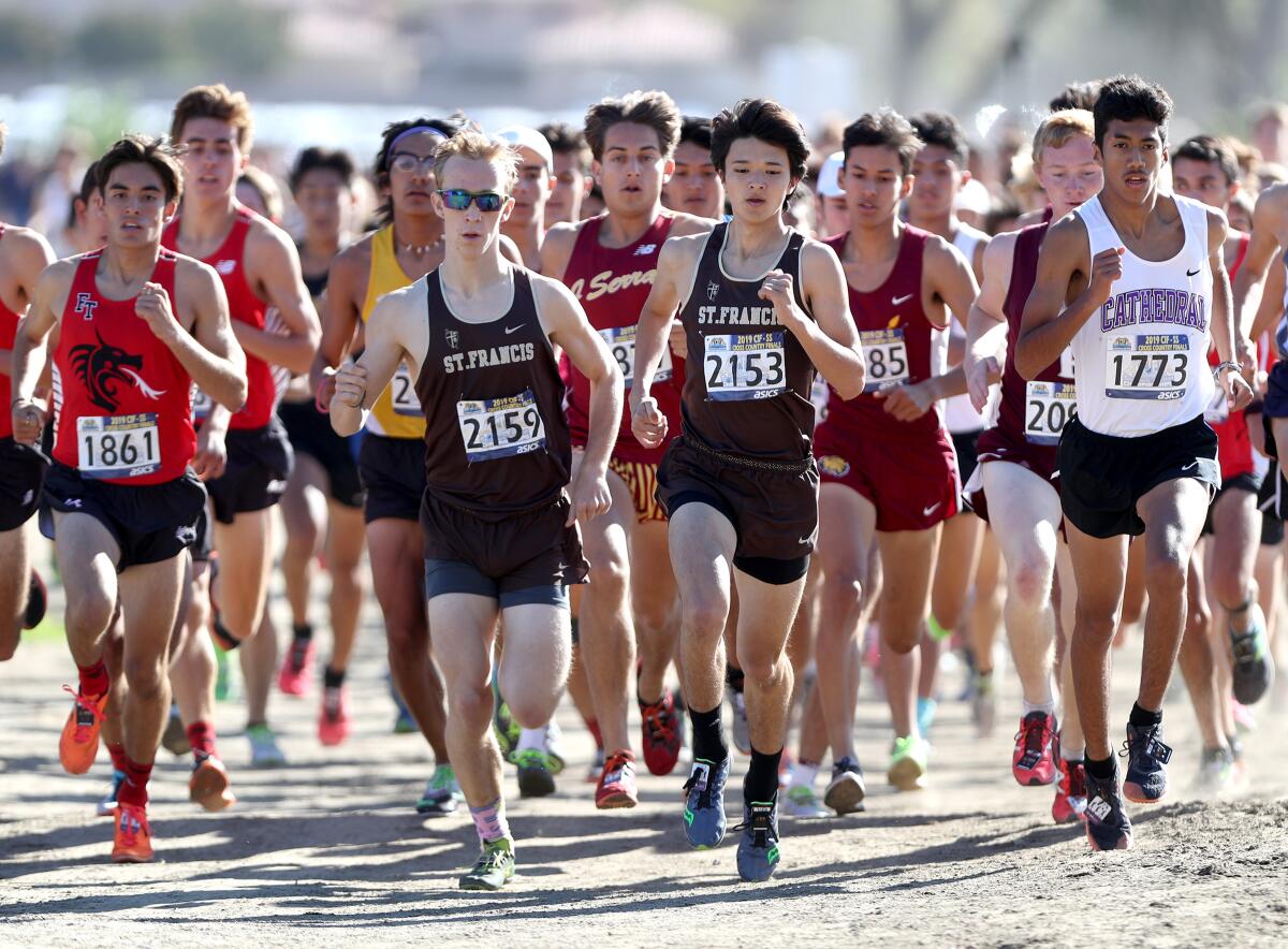St. Francis seniors Stuart Serventi, left, and Jason Suh ran in the boys division 4 CIF Southern Section Cross Country Finals, at Riverside City Cross-Country Course in Riverside on Saturday, Nov. 23, 2019.