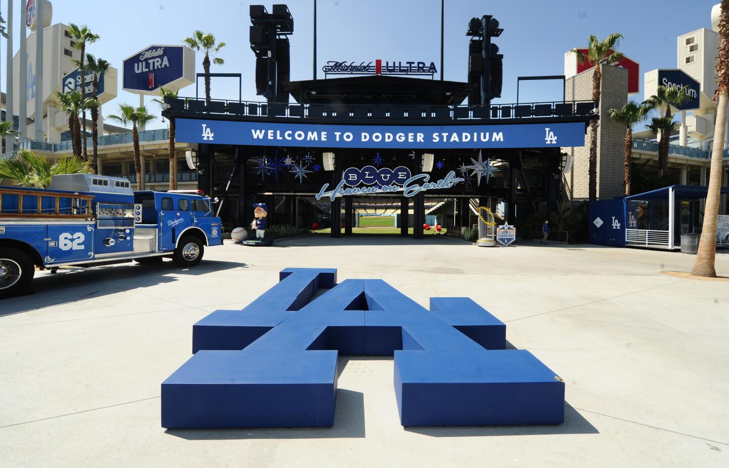 Dodger displays sit beyond the center field bleachers as the Dodgers prepare for opening day 2021 at Dodger Stadium.