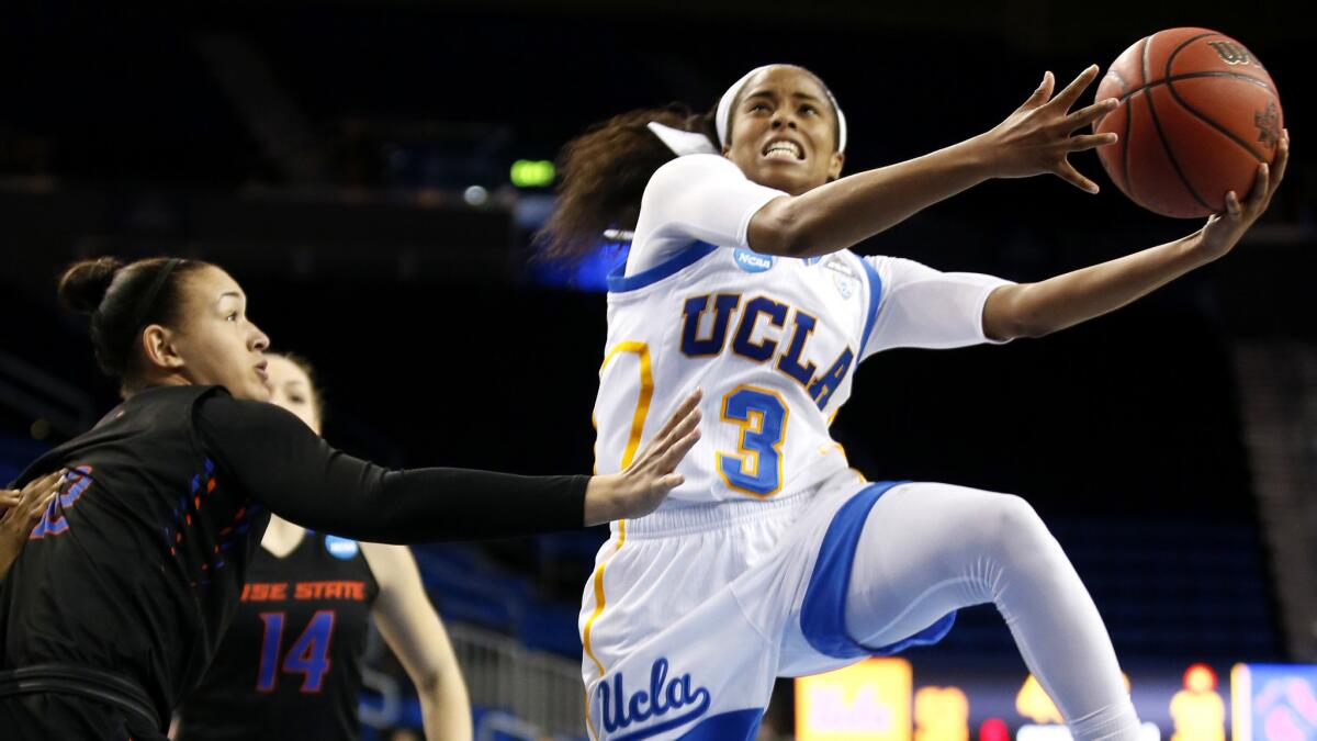UCLA guard Jordin Canada goes to the basket past Boise State forward Shalen Shaw during the second half Saturday.