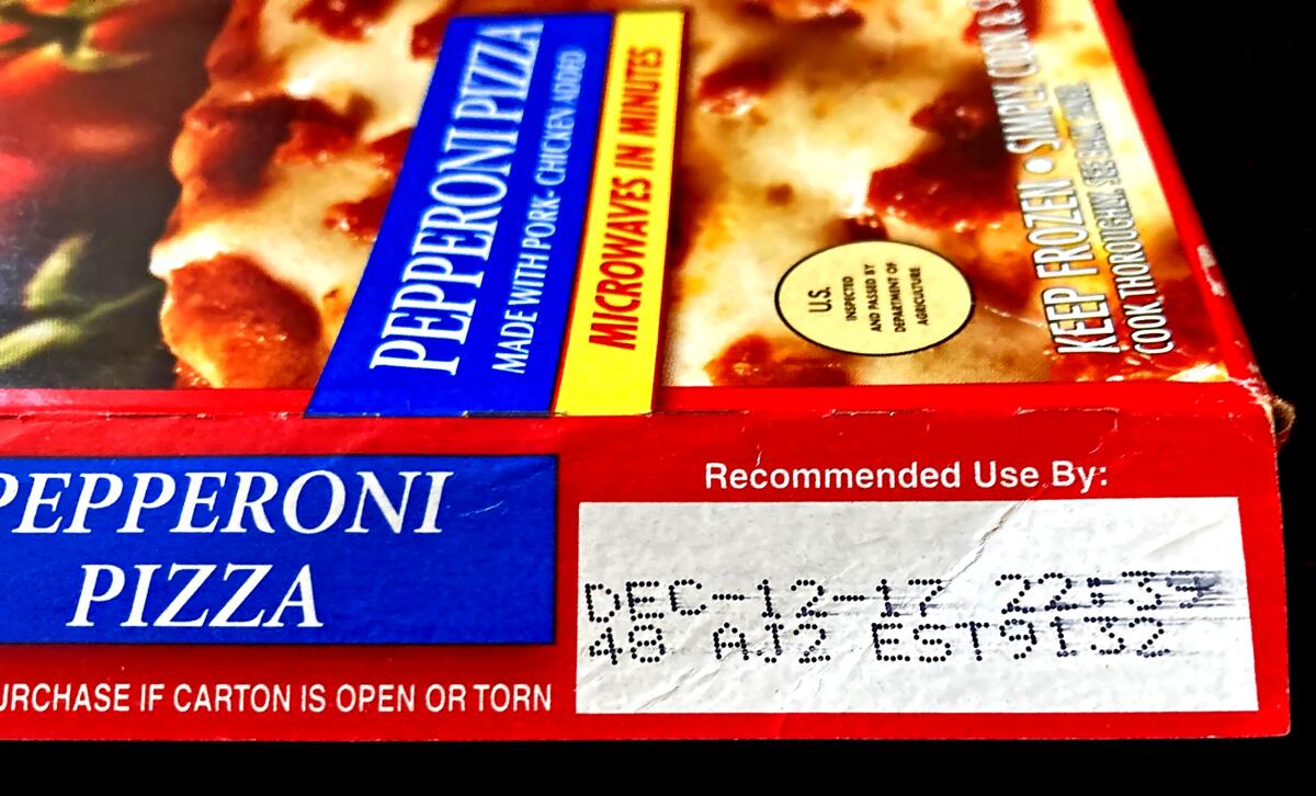 A box of frozen pepperoni pizza is shown with a recommended use-by date of Dec. 12, 2017.