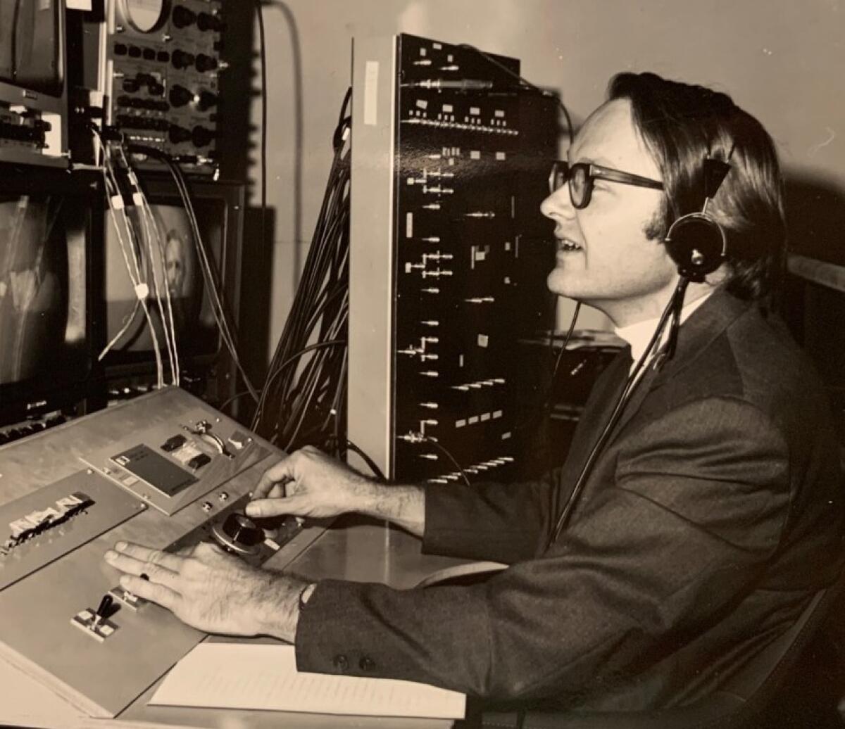 Bill English at the console of SRI's system in October 1968