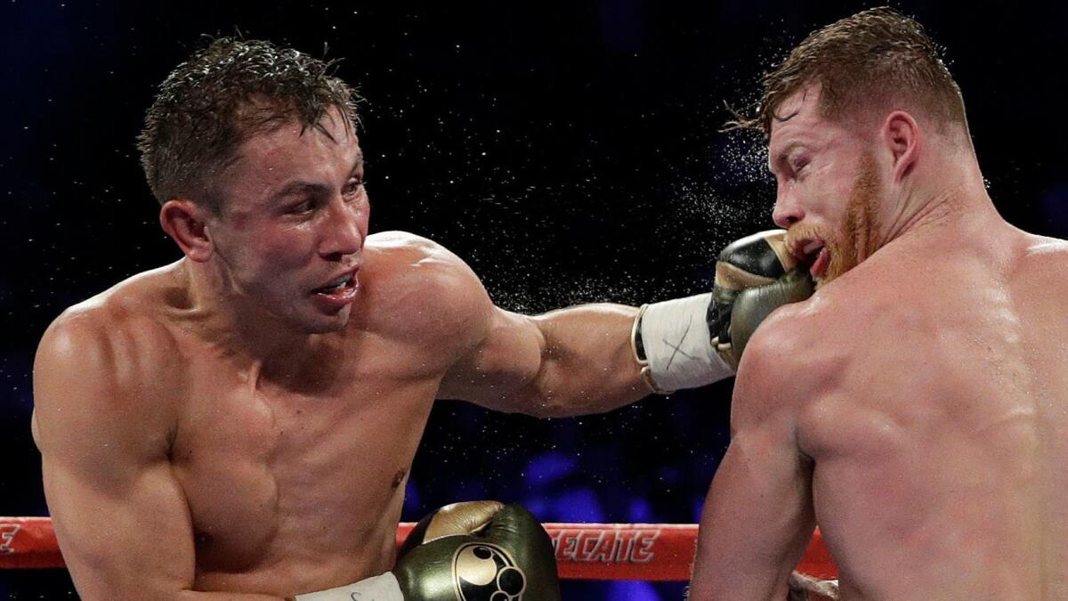 Gennady Golovkin, left, connects with a left to Canelo Alvarez during a middleweight title fight Sept. 17, 2017, in Las Vegas.