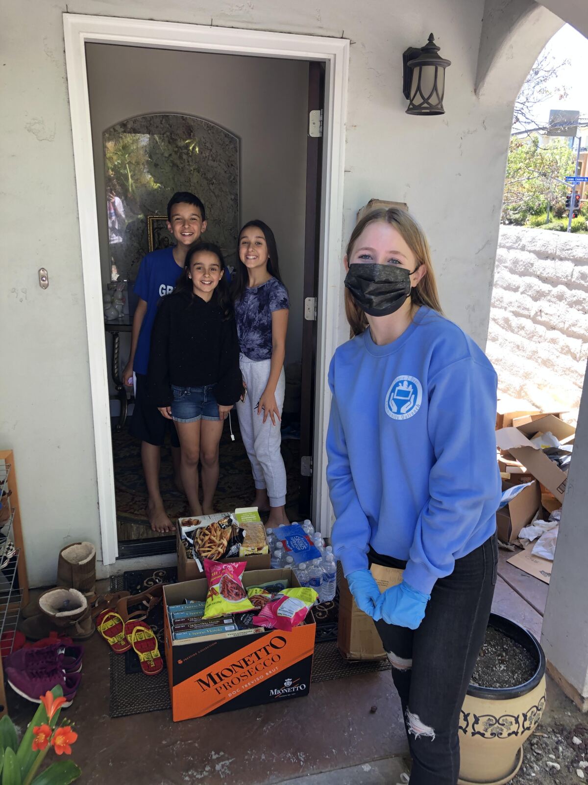 Torrey Pines junior Stella Bruce has been making grocery deliveries for Store 2 Door SD.