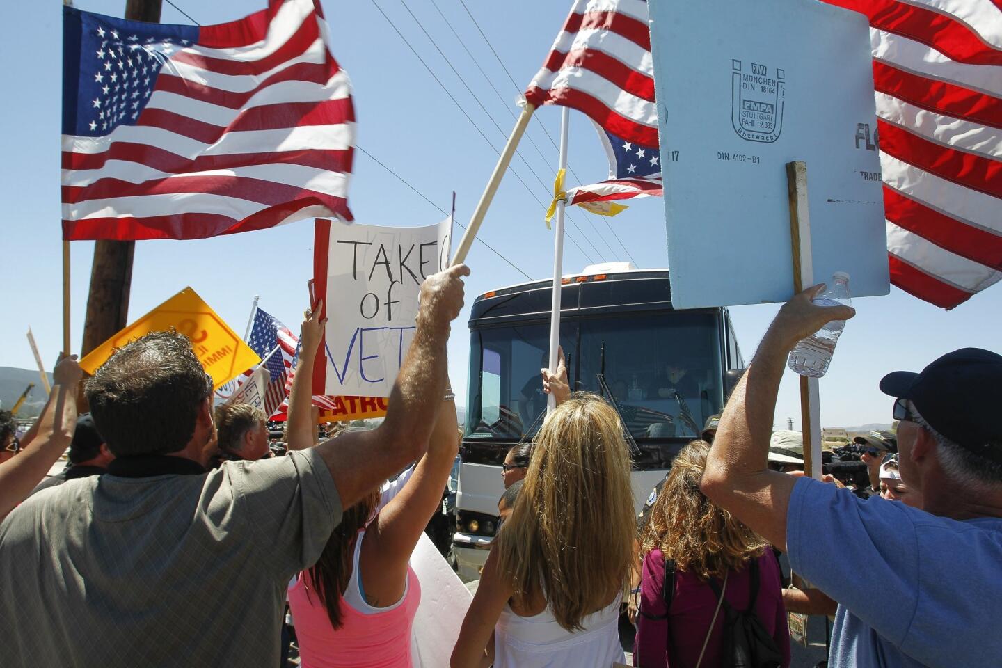 A group of protesters, against the illegal immigrant children and women being brought into Murrieta, prevent three Department of Homeland Security buses carrying the women and children from entering a Border Patrol facility in Murrieta.