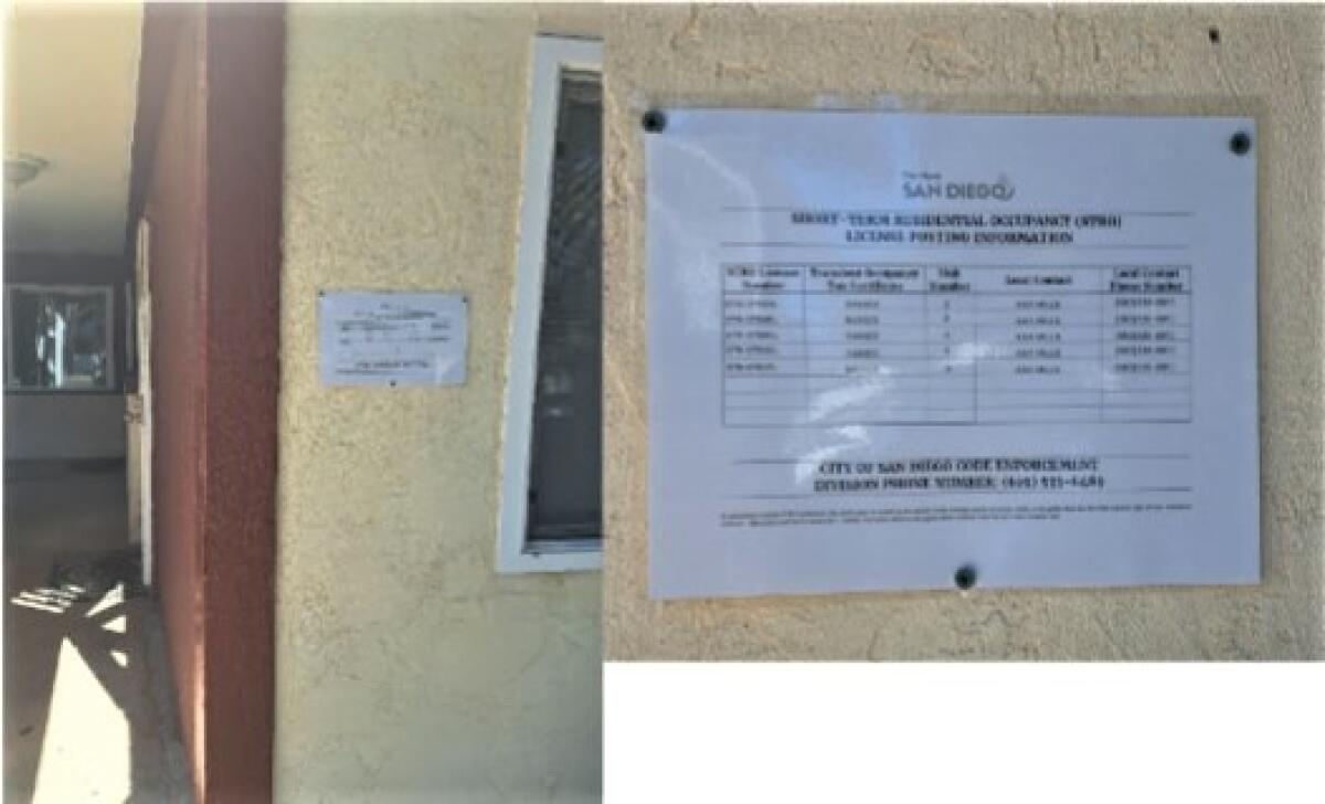 A notice at an Ocean Beach apartment complex says five units at the property are licensed to be used as short-term rentals.