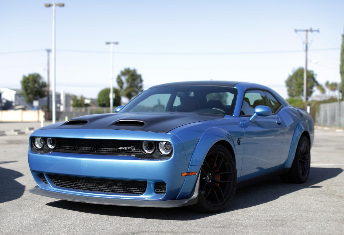 The Dodge Challenger Hellcat Redeye has a supercharged motor and mean looks to match.