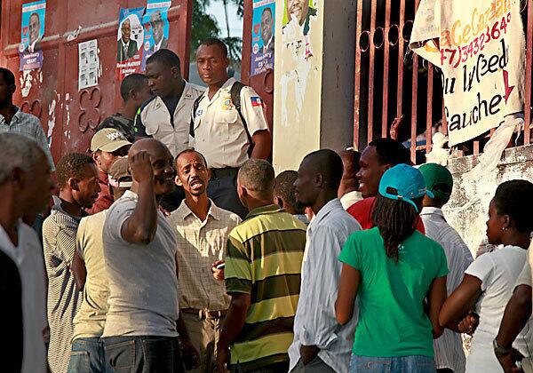 Haitians wait to vote