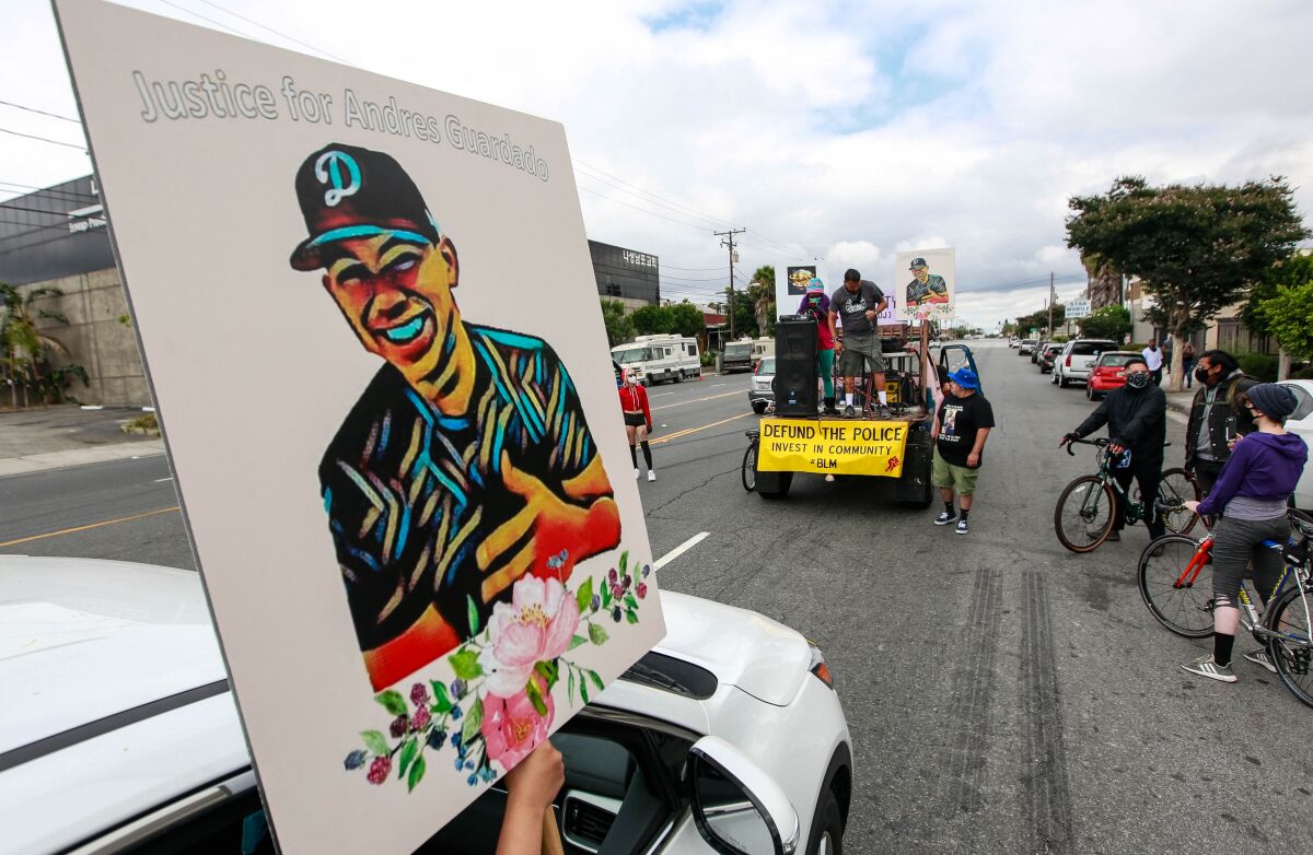 Family and friends rally for justice in the case of Andres Guardado, who was fatally shot by a sheriff's deputy in Gardena.