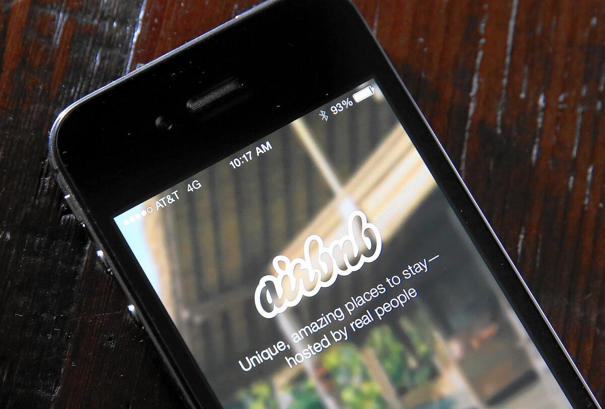 The Airbnb iOS app is displayed on an iPhone. Short-term rentals, which companies like Airbnb provide, will be discussed during Tuesday's Laguna Beach City Council meeting.
