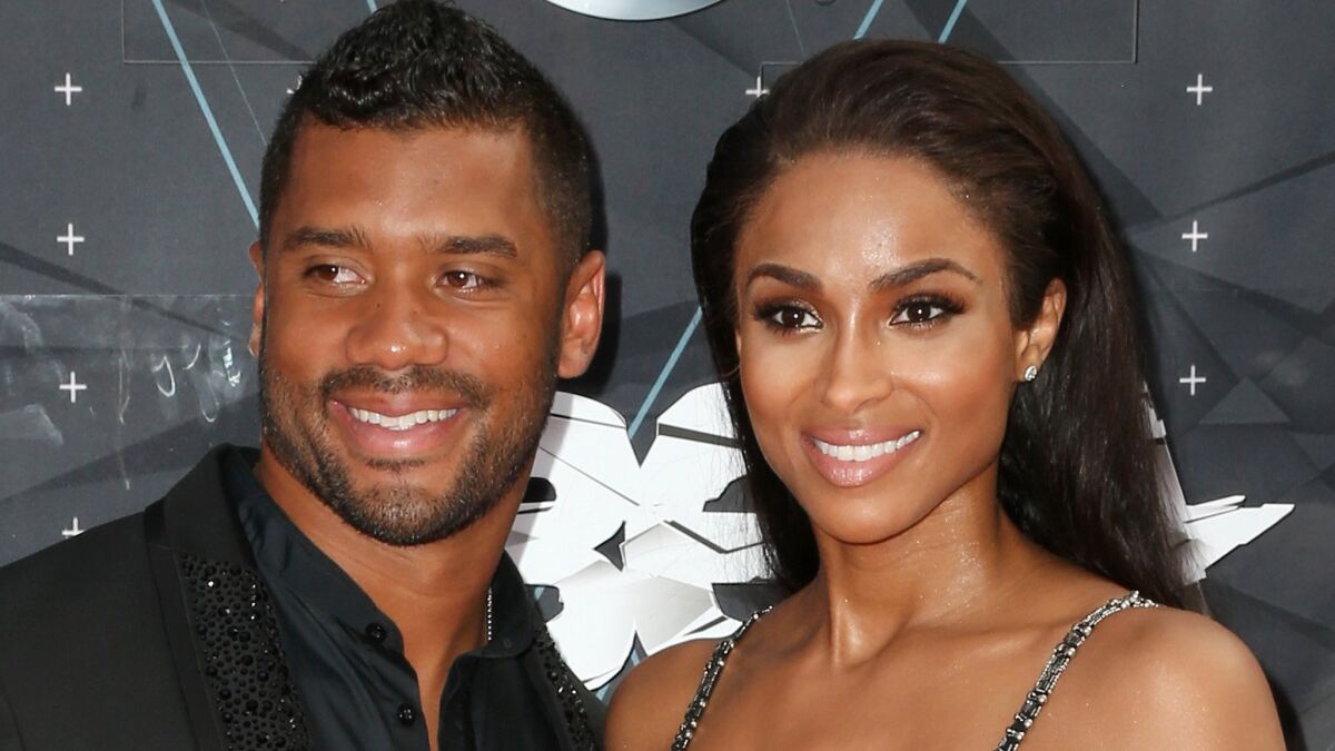 Seattle Seahawks quarterback Russell Wilson and recording artist Ciara made it a date at the 2015 BET Awards in Los Angeles in June.