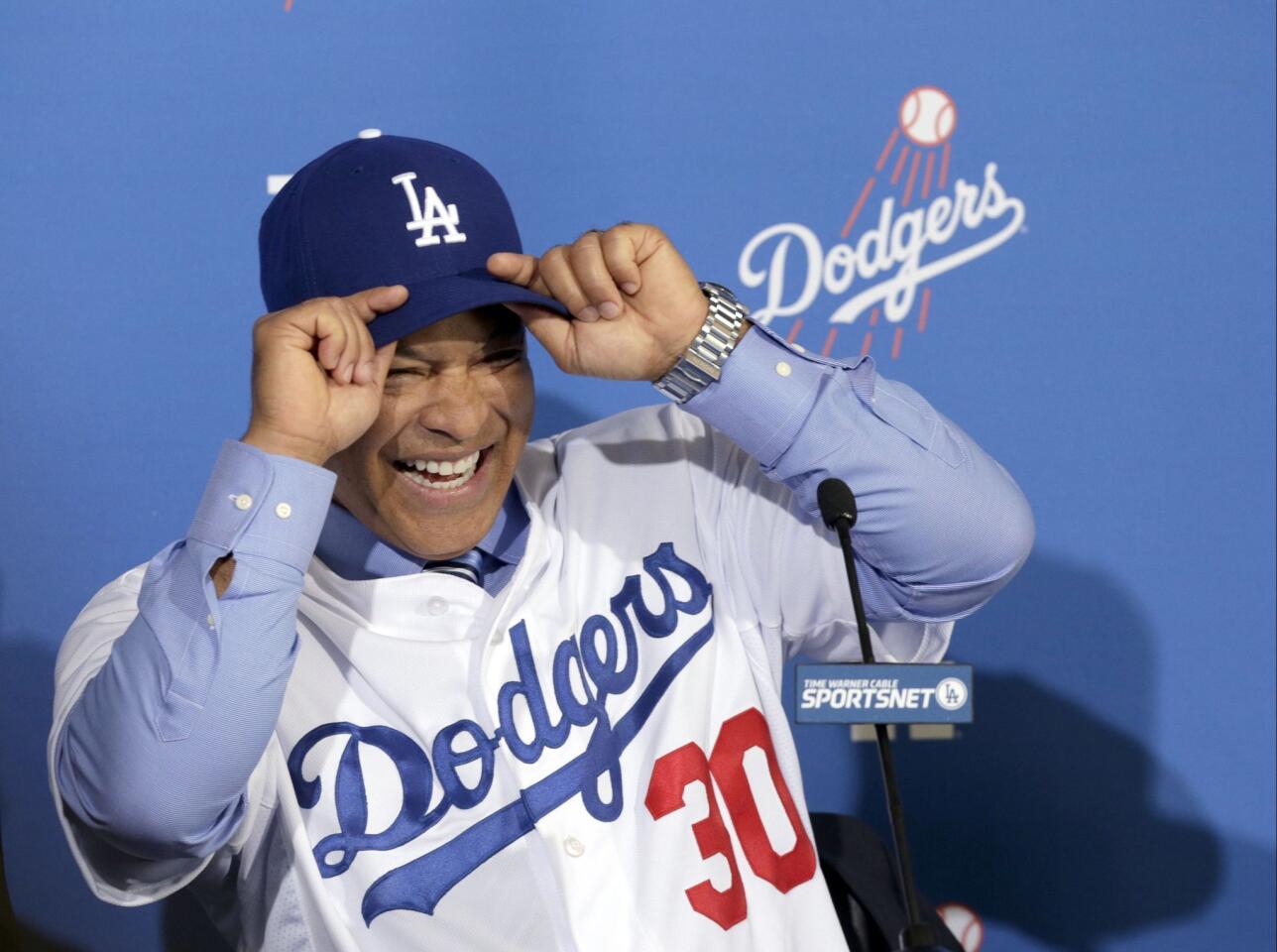 Los Angeles Dodgers Dave Roberts is officially introduced as the first minority manager in franchise history at Dodger Stadium in Los Angeles Tuesday, Dec. 1, 2015.