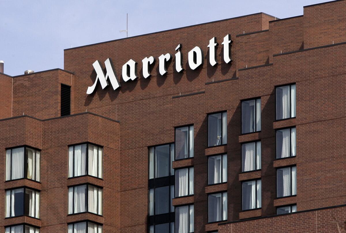 A Marriott Hotel is seen in Cambridge, Mass. The hotel operator was fined by the FCC on Friday for using a technology that deactivated personal hotspots in Nashville.