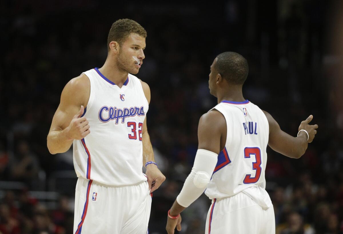 All-Stars Blake Griffin and Chris Paul talk before the Clippers played the Portland Trail Blazers on Nov. 8.