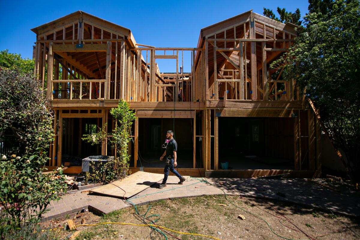 A view from the backyard of a construction project