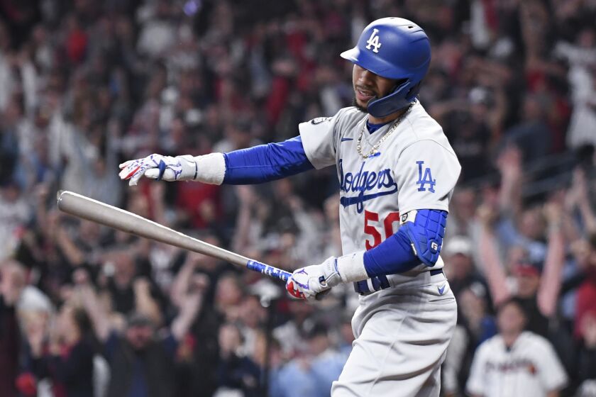 Atlanta, GA - October 23: Los Angeles Dodgers' Mookie Betts reacts after striking out during the seventh inning.