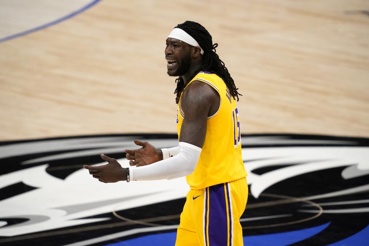 Lakers center Montrezl Harrell shouts toward an official during a loss to the Dallas Mavericks on Thursday