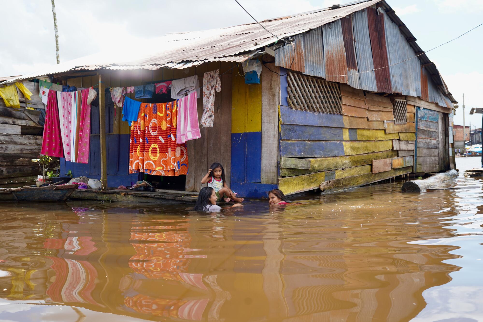 A home built above the water in the port district of Belen in Iquitos, Peru.