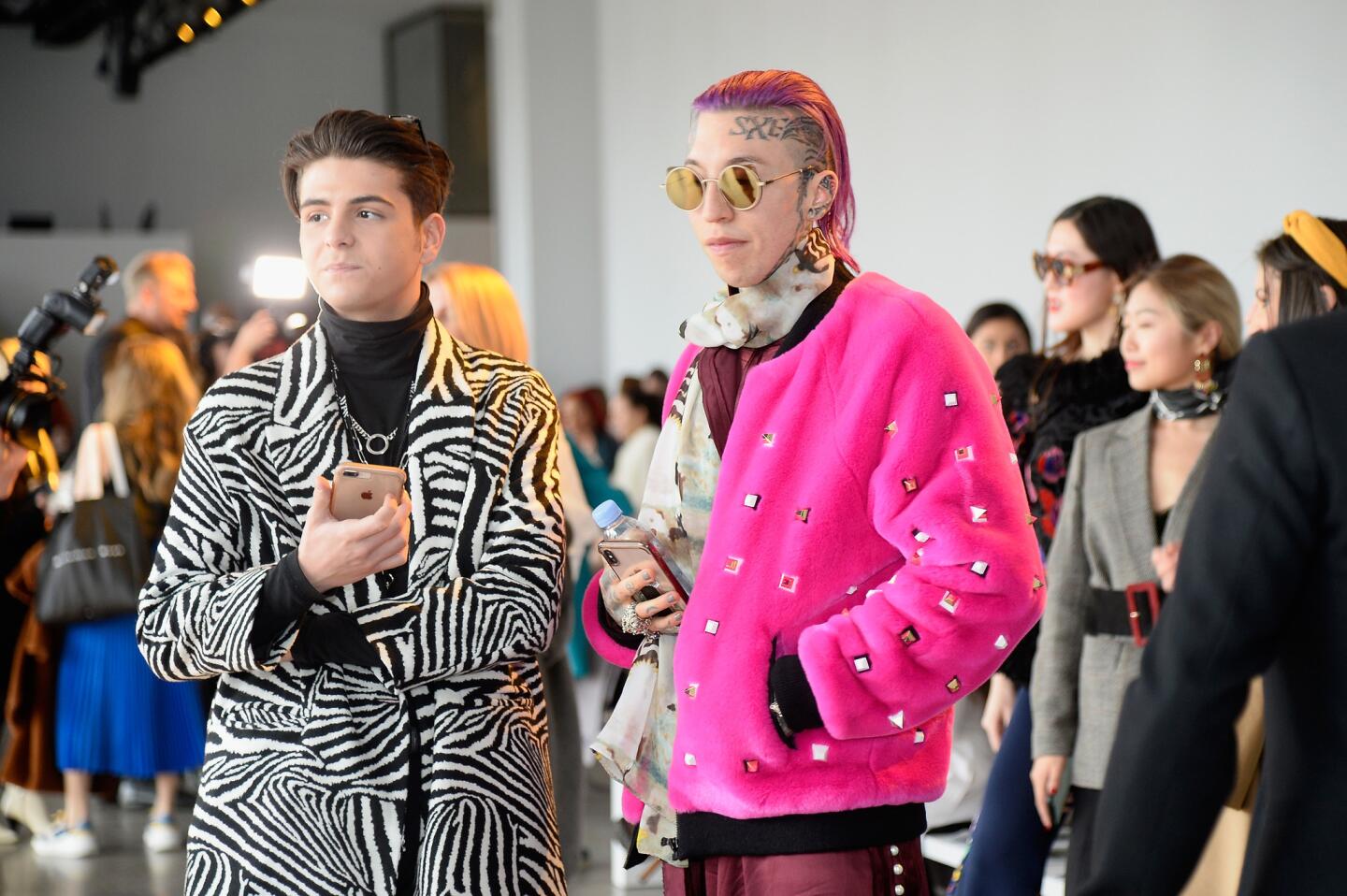 Chris Lavish (right) and guest backstage for Noon by Noor show during New York Fashion Week: The Shows at Gallery II at Spring Studios in New York City.