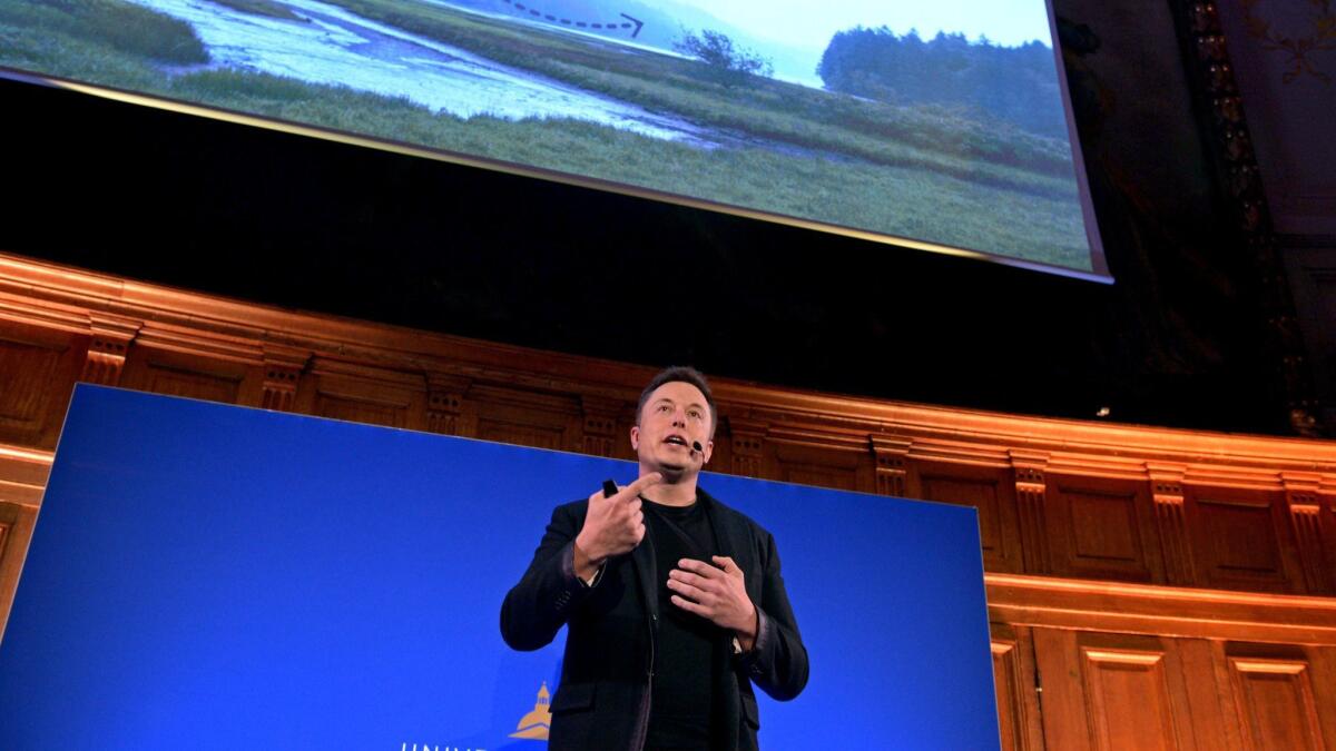 Elon Musk speaks comfortably at a climate change summit in 2015.