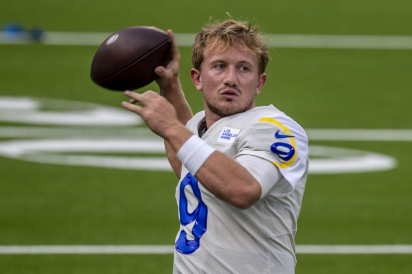 Rams backup quarterback John Wolford warms up before a scrimmage at SoFi Stadium on Aug. 22, 2020.