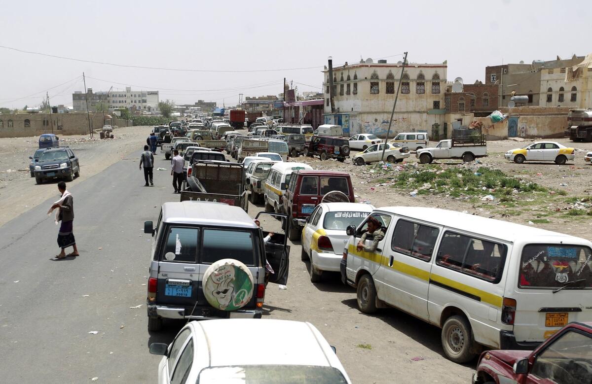 Yemeni drivers line up for fuel on May 18 amid an acute shortage in the capital, Sana.