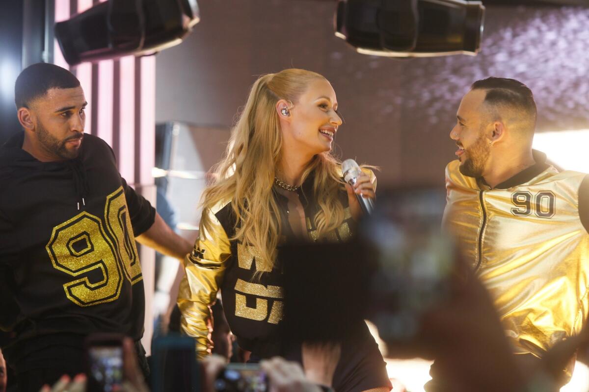 Iggy Azalea performs at the Samsung Milk Music Lounge during the SXSW Music Festival on early Thursday morning, March 19, 2015 in Austin, Texas. (Photo by Jack Plunkett/Invision/AP)