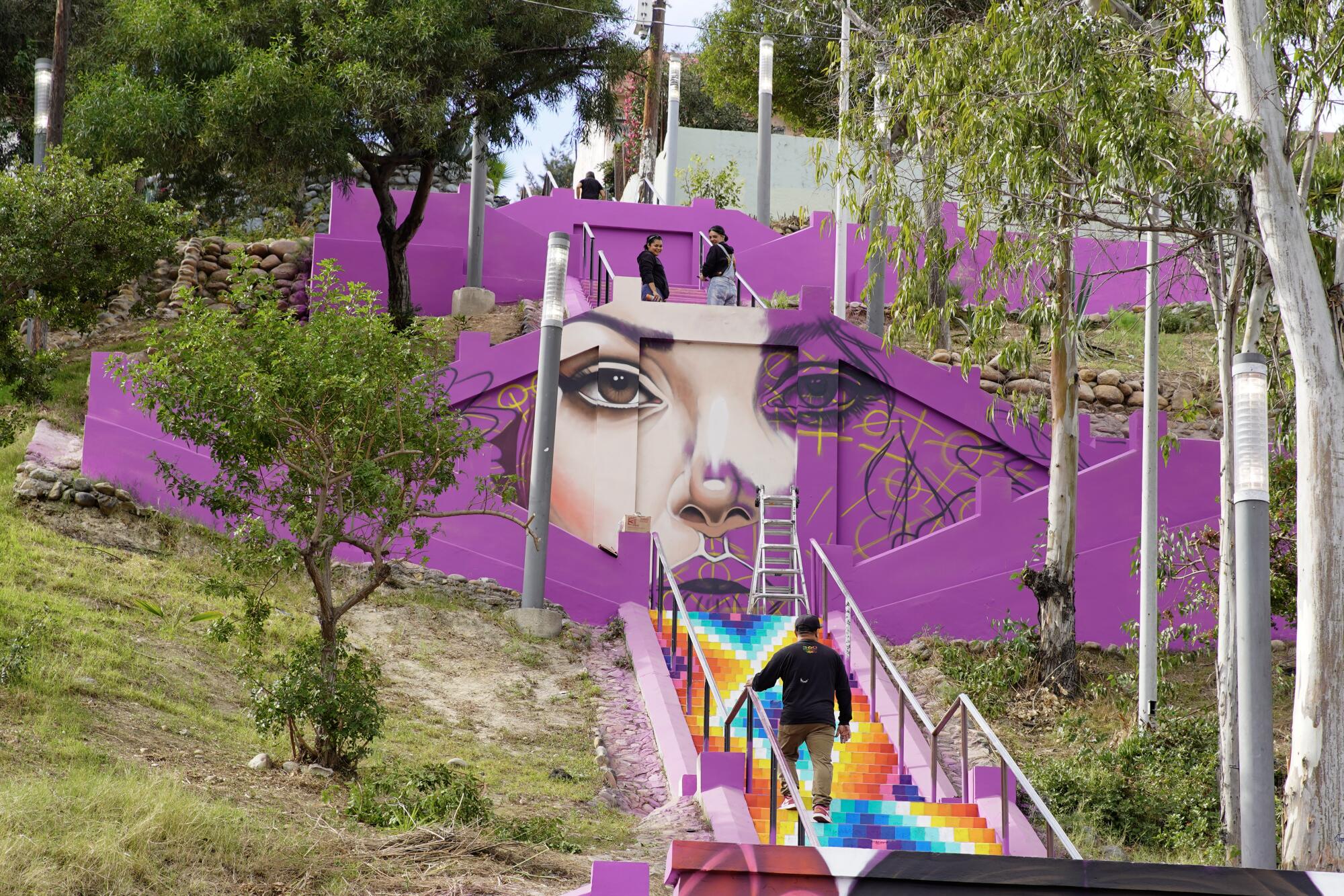 From drab stairway to an explosion of color, muralists add 'very Mexican  touch' to Tijuana landmark - The San Diego Union-Tribune