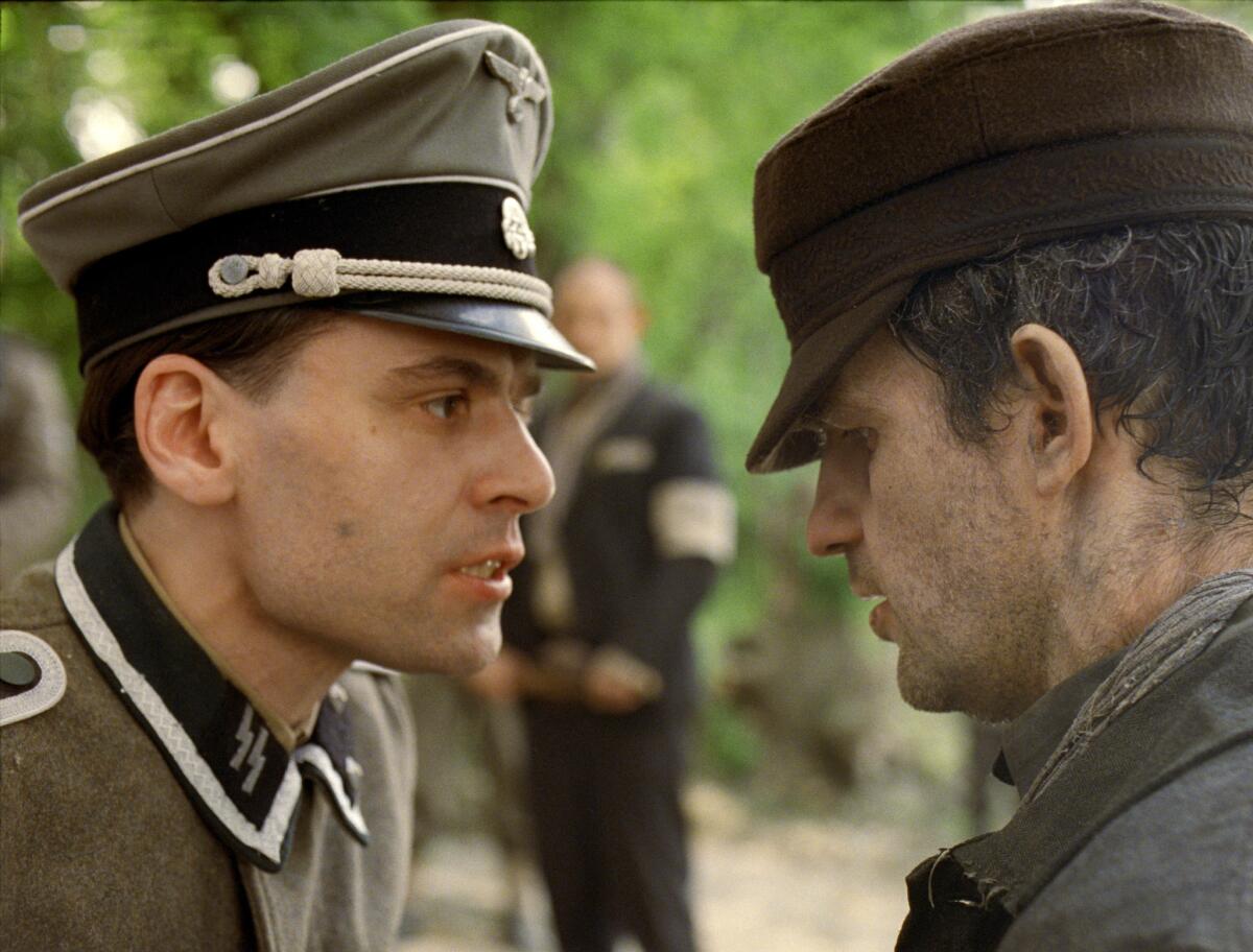 Christian Harting, left, and Geza Rohrig in a scene from "Son of Saul."