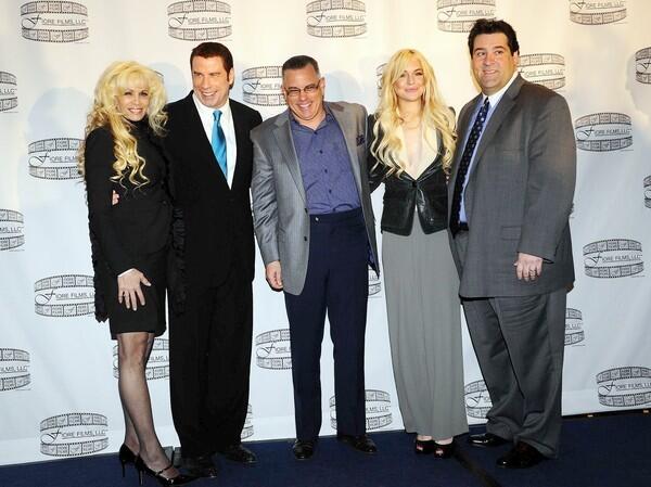 Victoria Gotti, left, John Travolta, John Gotti Jr., Lindsay Lohan and Marc Fiore pose for a photo during a news conference at the Sheraton Hotel in New York on April 12, 2011, promoting "Gotti: Three Generations." Fiore Films, an independent production company, announced Travolta's signing to star in the film, which is based on the life of Gotti Jr. and his relationship with his mobster father John Gotti. Lohan is in talks to play Gotti's daughter, Victoria.