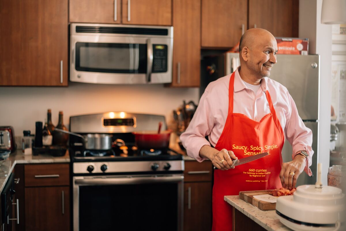 Renowned Indian cook Raghavan Iyer prepares a lunch of vegetable rice and kidney beans at his home in Minneapolis.
