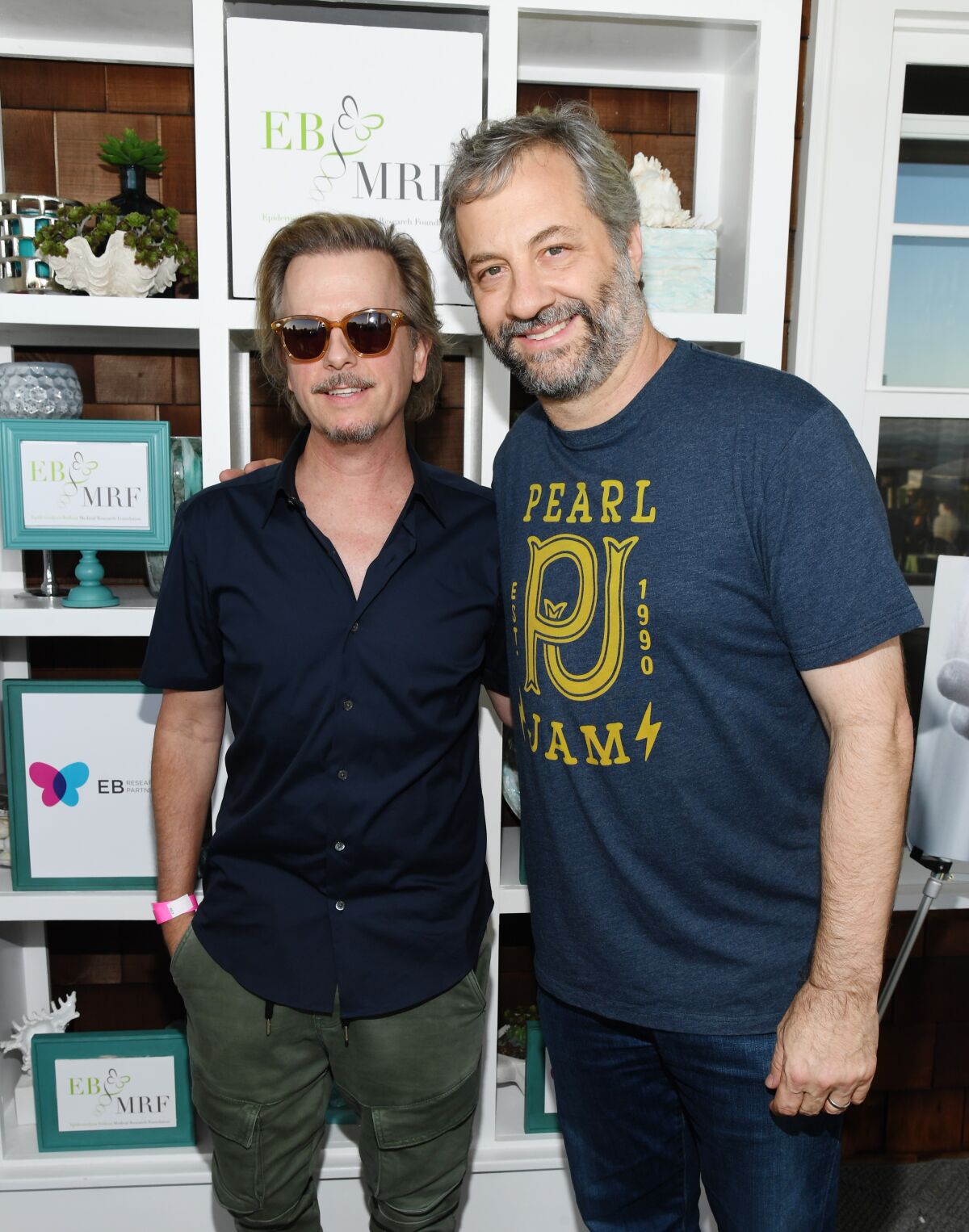 David Spade, left, and Judd Apatow attend Rock4EB! at a private residence in Malibu on Oct. 6, 2019.