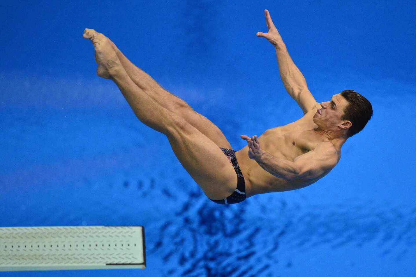U.S. diver Troy Dumais competes in the men's 3m springboard final. Dumais, who finished fifth, is the first U.S. men's diver to compete in four Olympics.