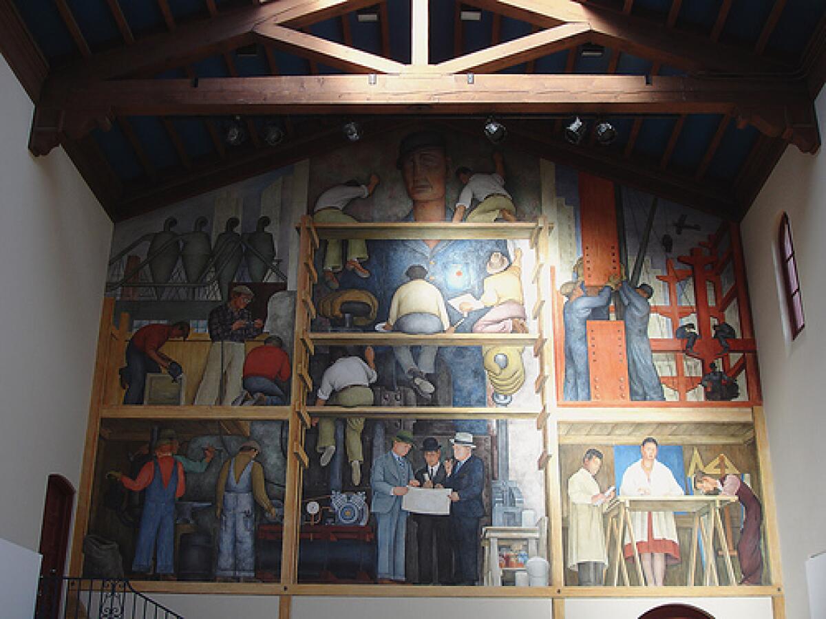 A view of Diego Rivera's mural at the SFAI, which depicts an artist painting a fresco. 