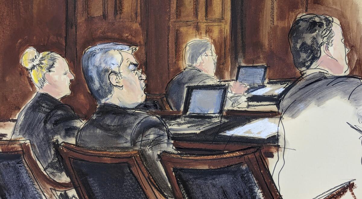 A courtroom sketch of former Honduran President Juan Orlando Hernández seated at a table between two attorneys.