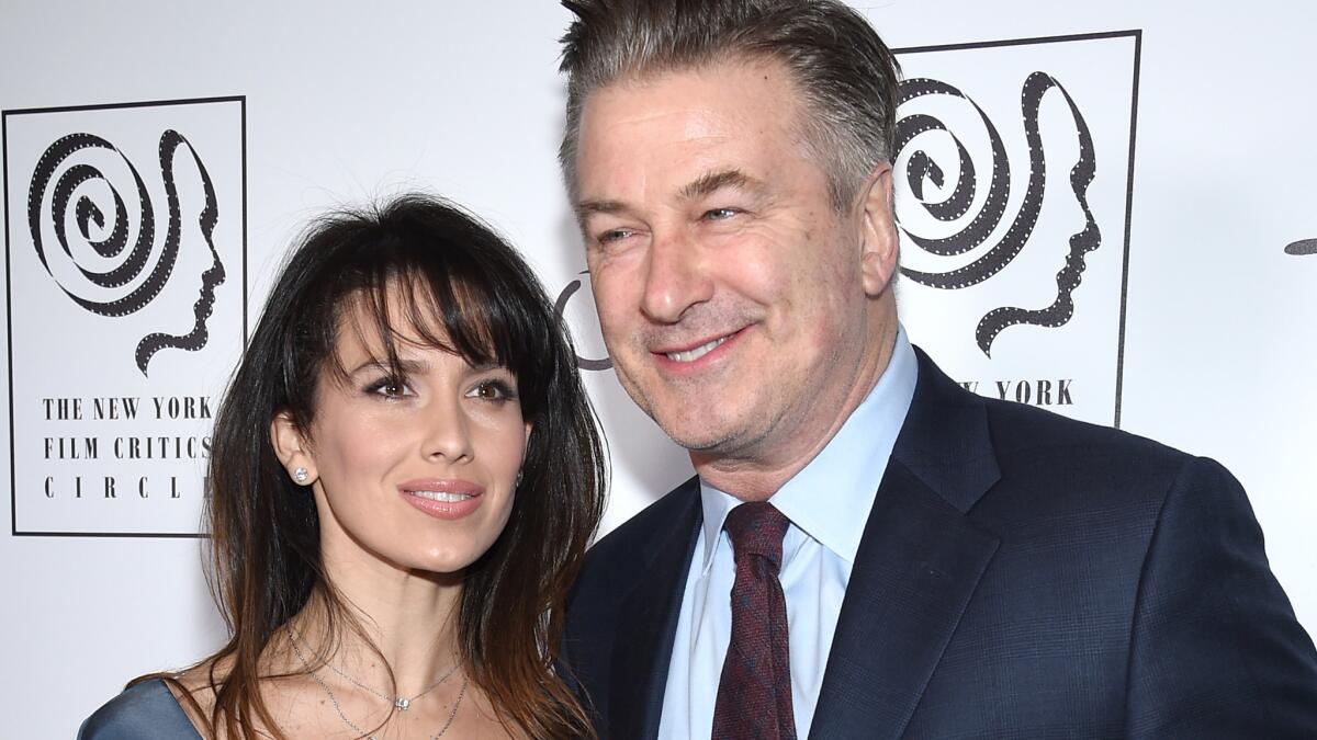 Alec Baldwin poses with wife Hilaria Baldwin