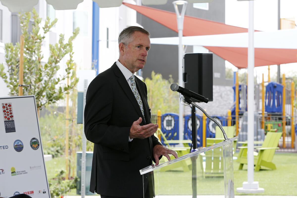 Mayor Patrick Harper speaks during a ribbon-cutting ceremony for Prado, an affordable housing community, on Wednesday.