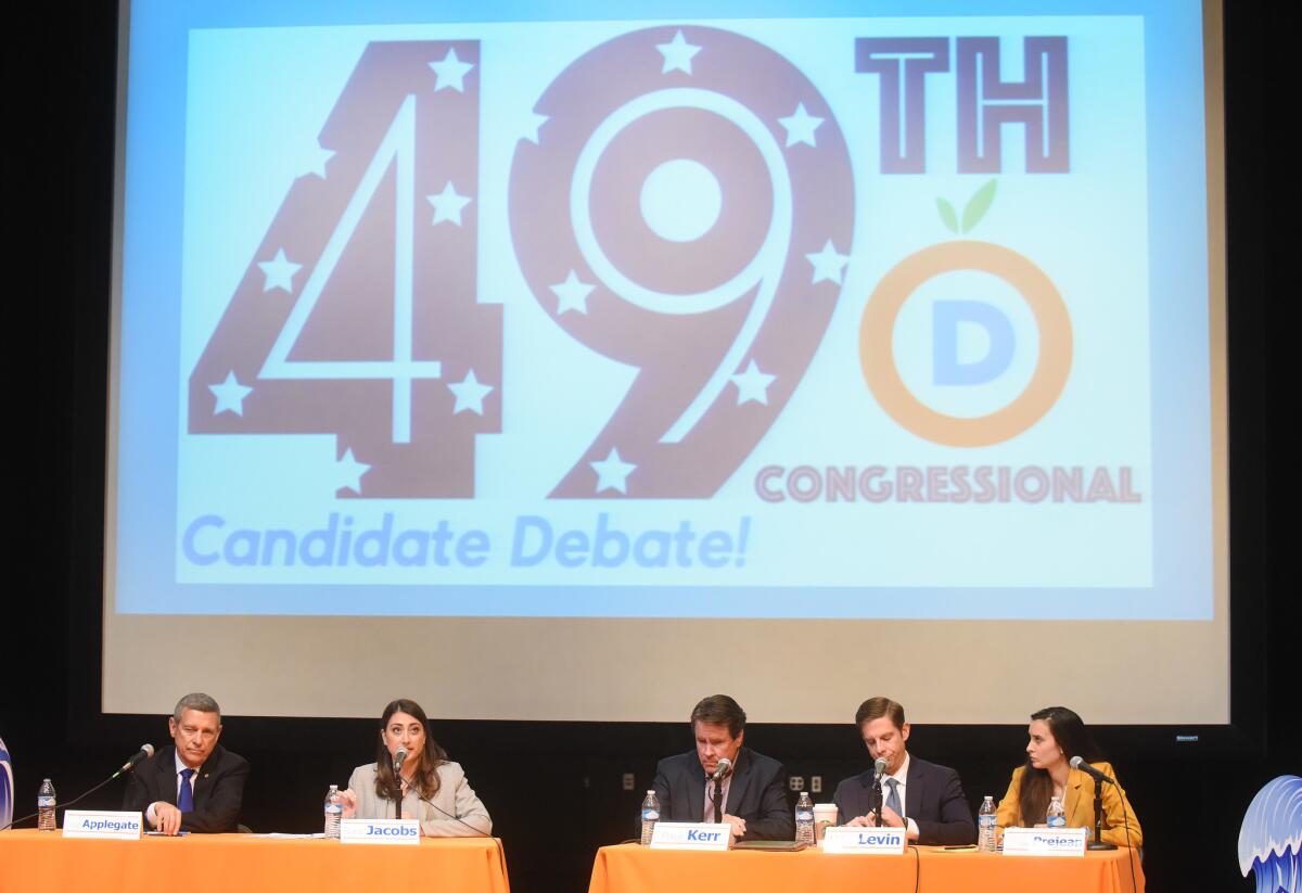 Candidates Doug Applegate, Sara Jacobs, Stever Kerr, Mike Levin and Christina Prejean participate in a debate at San Juan Hills High School.
