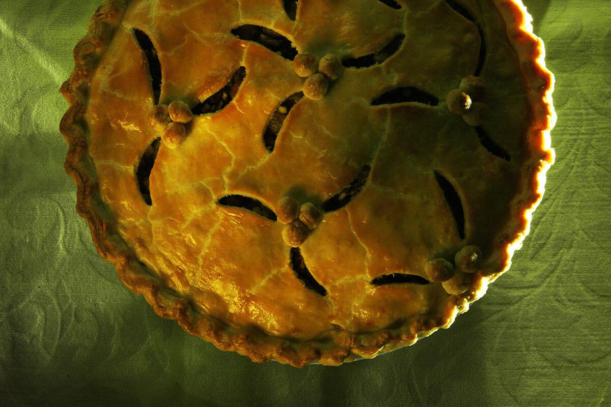 Mincemeat pie gets a festive top crust.