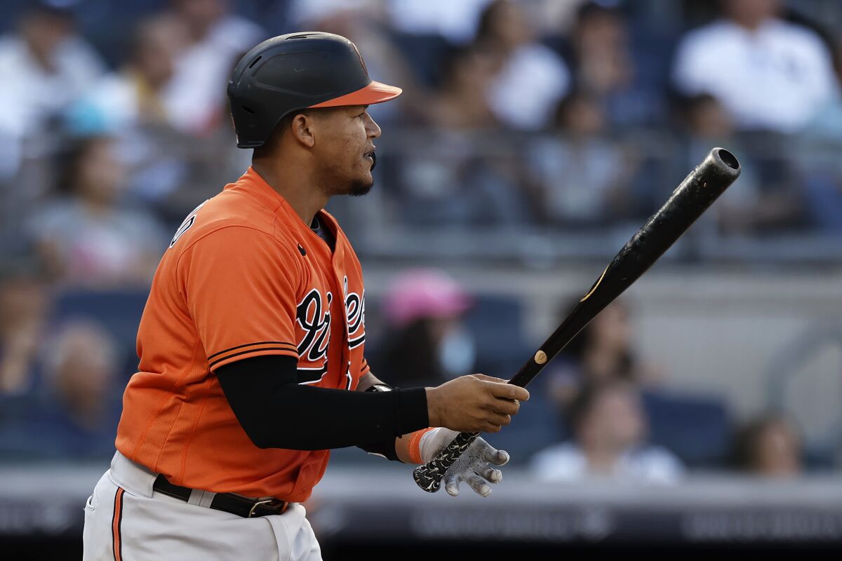 Baltimore Orioles' Pedro Severino watches his run scoring sacrifice fly against the New York Yankees during the ninth inning of a baseball game on Saturday, Sept. 4, 2021, in New York. The Orioles won 4-3. (AP Photo/Adam Hunger)