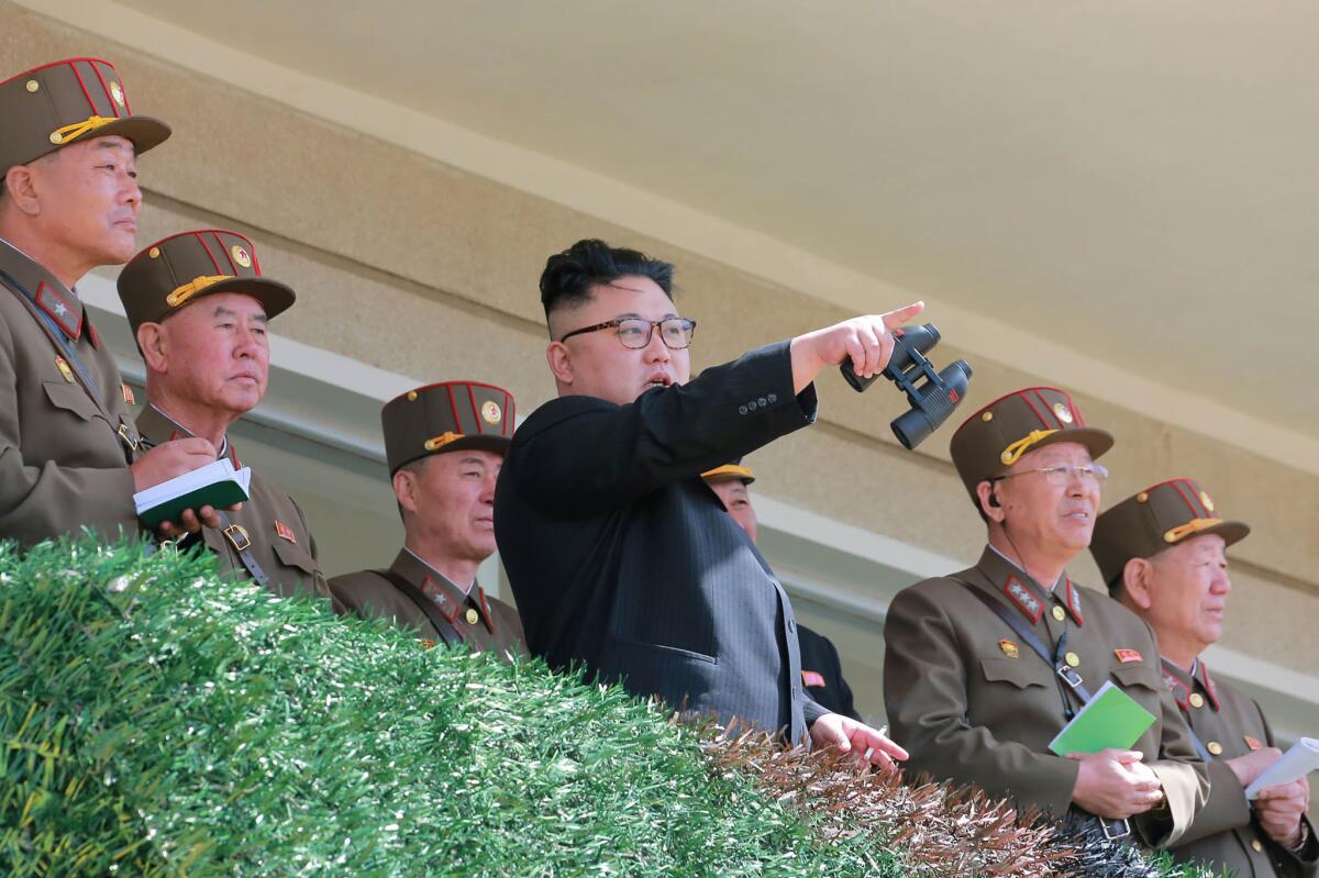 North Korean leader Kim Jong Un inspects a special forces commando operation on April 13.