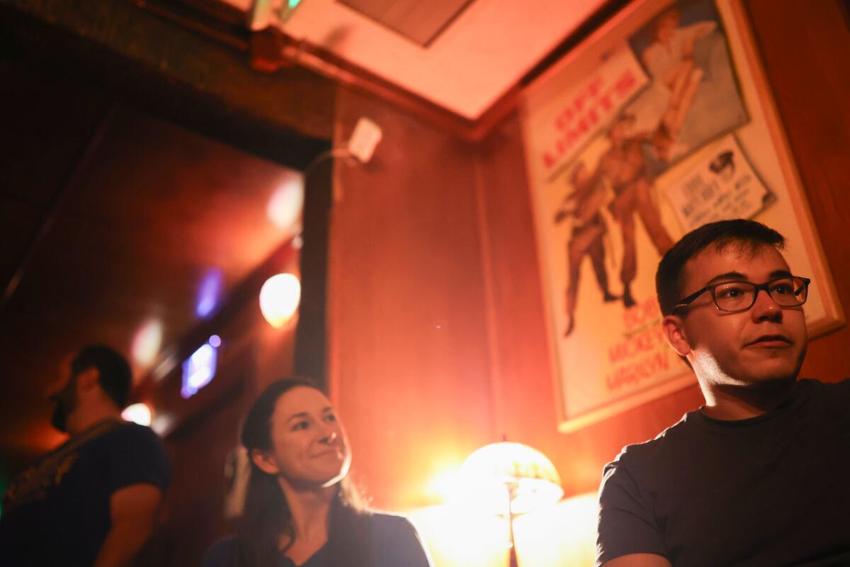 A young man is interviewed in the comics' lounge at the Laugh Factory before a comedy show.